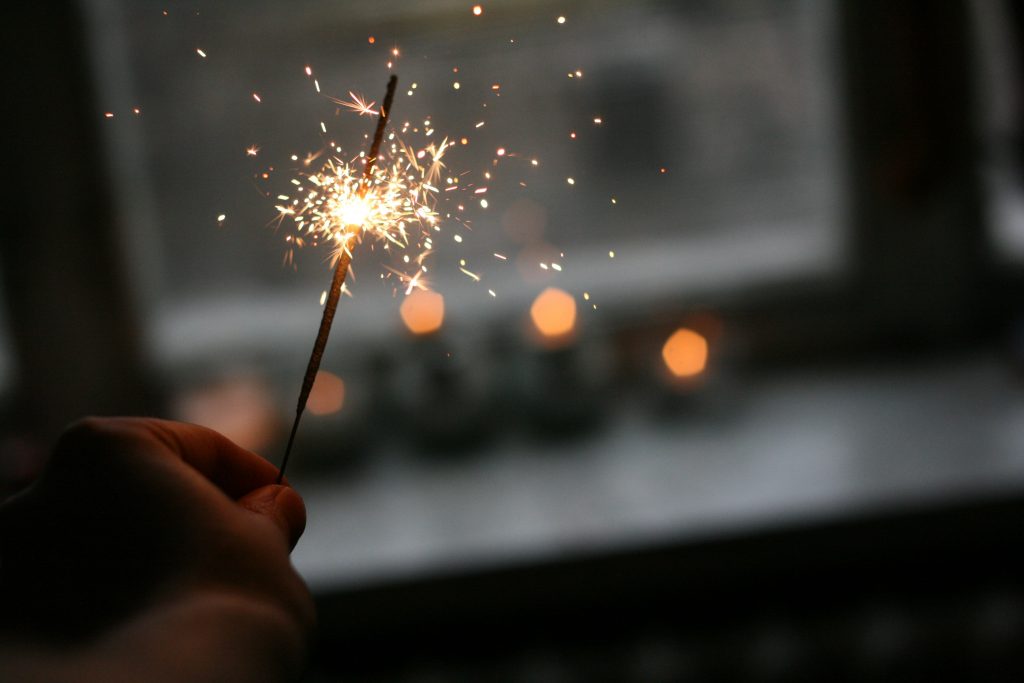 Image of someone holding a sparkler